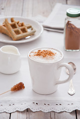 Home Cooked coffee with milk in a white cup