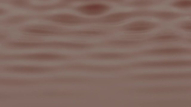 blurry waves of red liquid forming patterns to an audio speaker frequency. macro cymatic shot.