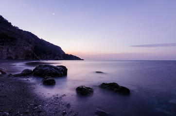 First hours of the day at Cantarrijan beach, the best nudist beach on the Costa del Sol and Costa Tropical of Granada