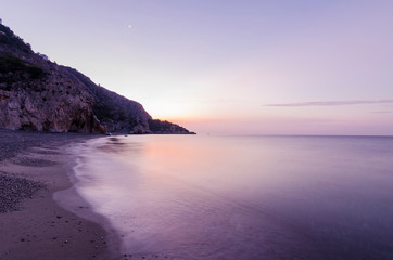 First hours of the day at Cantarrijan beach, the best nudist beach on the Costa del Sol and Costa Tropical of Granada