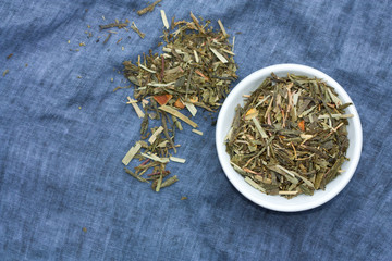 Bowl of dried green tea.