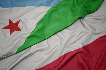 waving colorful flag of poland and national flag of djibouti.