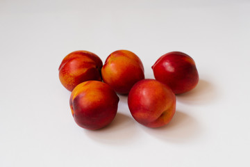 organic fresh nectarines on white background