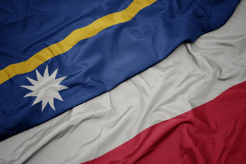 waving colorful flag of poland and national flag of Nauru .