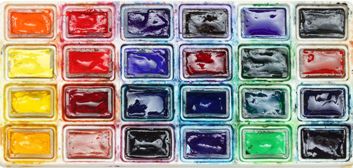 Colorful Box with watercolors palette background..