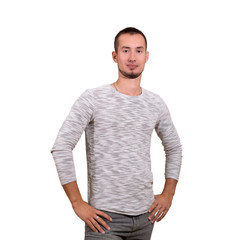 Fototapeta premium young man stands on a white background isolated