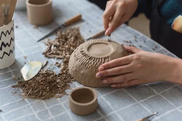 Foto op Plexiglas Pottery workshop, the process of making ceramic tableware, women's hands © iwavephoto