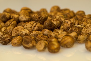Right Hazelnuts kernels in the background.