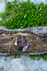 Gold Jewelry Necklaces with Crystals on Wood