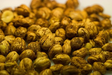 Right Hazelnuts kernels in the background.