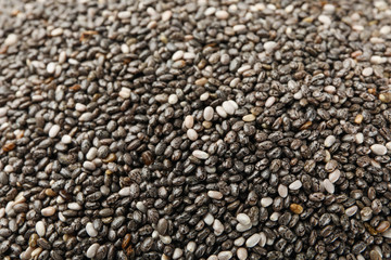 Chia seeds on whole background, close up