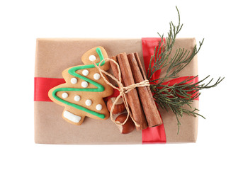 Christmas gift box with decoration on white background, top view