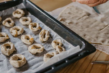 woman making traditional Christmas sweets and desserts