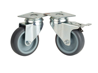 Wheels made of polyamide and gray rubber in a metal bracket isolated on a white background