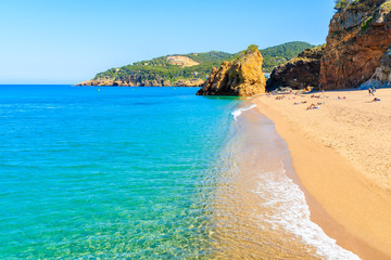 Sea wave on Cala Moreta beach and view of rocks, Costa Brava, Catalonia, Spain