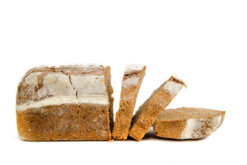 Dark bread isolated on a white background. The concept of baking bread, eating meals with rolls, bread. Product made of wheat and rye flour, bread preparation.