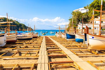 Fishing boats on beach in beautiful Sa Riera village, Costa Brava, Catalonia, Spain