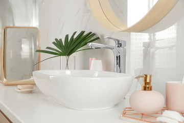Fototapeta na wymiar Stylish bathroom interior with vessel sink and decor elements