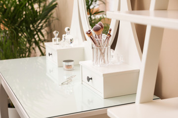 Dressing table with mirror in stylish room interior