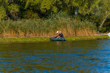 Fishermen on boats in the Kushugum