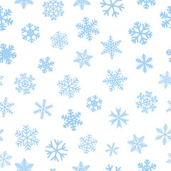 Christmas seamless pattern of snowflakes, light blue on white background
