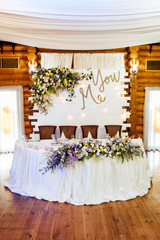 Luxurious wedding presidium in white with silver elements.