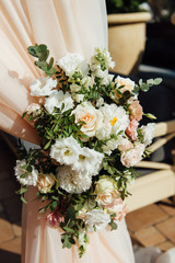 Arch for the wedding ceremony, decorated with cloth and flowers