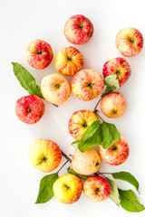 Autumn composition with fresh apples on white background top view
