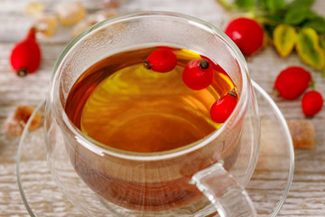 Rosehip tea in a glass cup