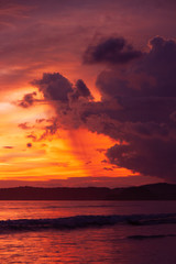 Beautiful vivid sky over the beach scenery with sea view, clouds, and waves. Nature beauty composition.