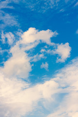 Naklejka na ściany i meble white Cirrus clouds on blue the sky