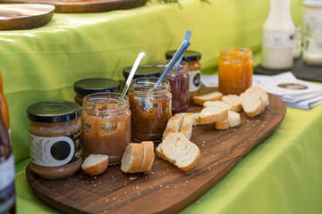 Various marmelades and spreads prepared for outdoor breakfast.