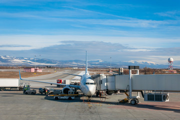 Fototapeta na wymiar Airplane Refueling at Sofia Airport, Bulgaria, Europe