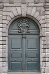 Old closed door - architectural detail from Antwerp, Belgium
