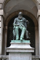 Fototapeta na wymiar Statue of the Flemish writer Hendrik Conscience, pioneer of Dutch-language literature in Flanders, Antwerp, Belgium
