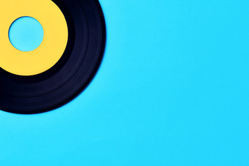 Vinyl record on blue background