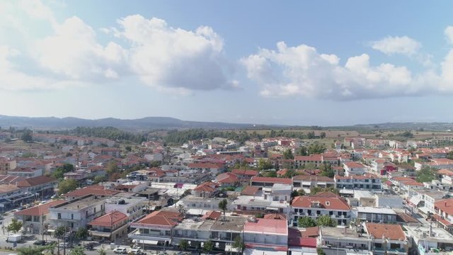 Aerial view of Kallithea village. During the summer, Kallithea is the most popular village in Halkidiki, Greece. 4K