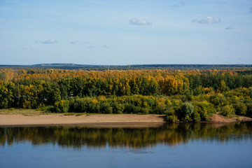 Fototapeta na wymiar View of the river Vyatka in Kirov, Russia. Sunny autumn day. Beautiful landscape.
