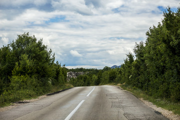 Fototapeta premium a broken road in the mountains of Republika Srpska