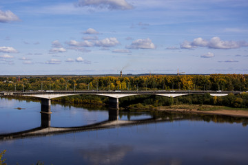 View of the bridge over the Vyatka river in Kirov, Russia. Autumn Sunny day.