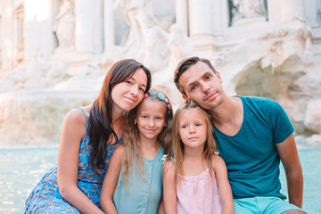 Portrait of family at Fontana di Trevi, Rome, Italy.