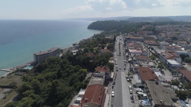 Aerial view of Kallithea village. During the summer, Kallithea is the most popular village in Halkidiki, Greece. 4K