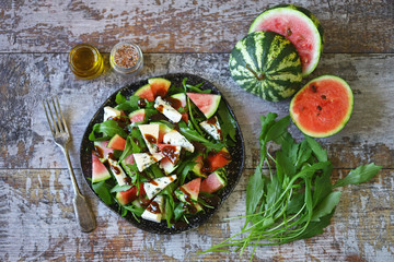 Healthy salad with blue cheese, watermelon and arugula. Healthy food. Keto diet.