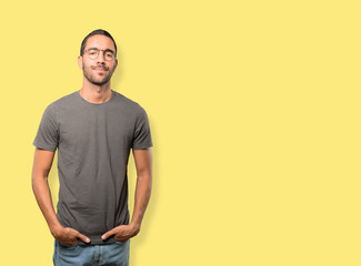 Fototapeta premium Serious young man looking up gesture