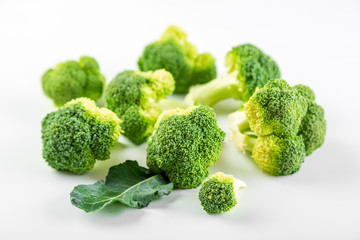 Raw smoll broccoli isolated on white background