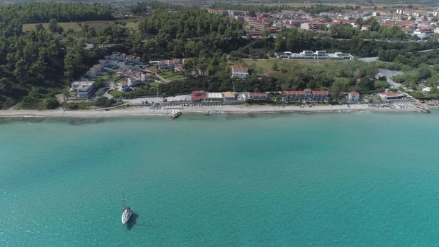 Aerial view of Kallithea village. During the summer, Kallithea is the most popular village in Halkidiki, Greece. 4K