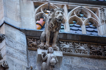 Elements of Gothic architecture. Grotesque, chimera and gargoyle sculptures on the facade of an...