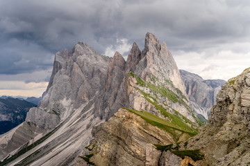 Fototapeta na wymiar Incoming storm to the Seceda peak at the beautiful Val Gardena valley in Dolomites mountains, Alps, Italy.