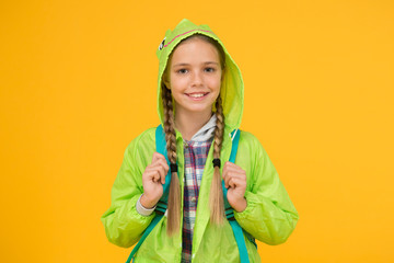 Rain is not hindrance. Waterproof cloak. Waterproof fabric for your comfort. Rainproof accessory. Schoolgirl hooded raincoat going to school. Waterproof clothes. Kid girl happy wear raincoat