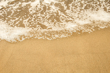 background texture sea wave on sand